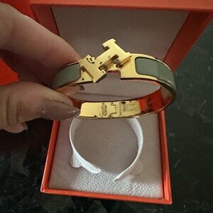 Hermes Clic H bracelet gold and grey